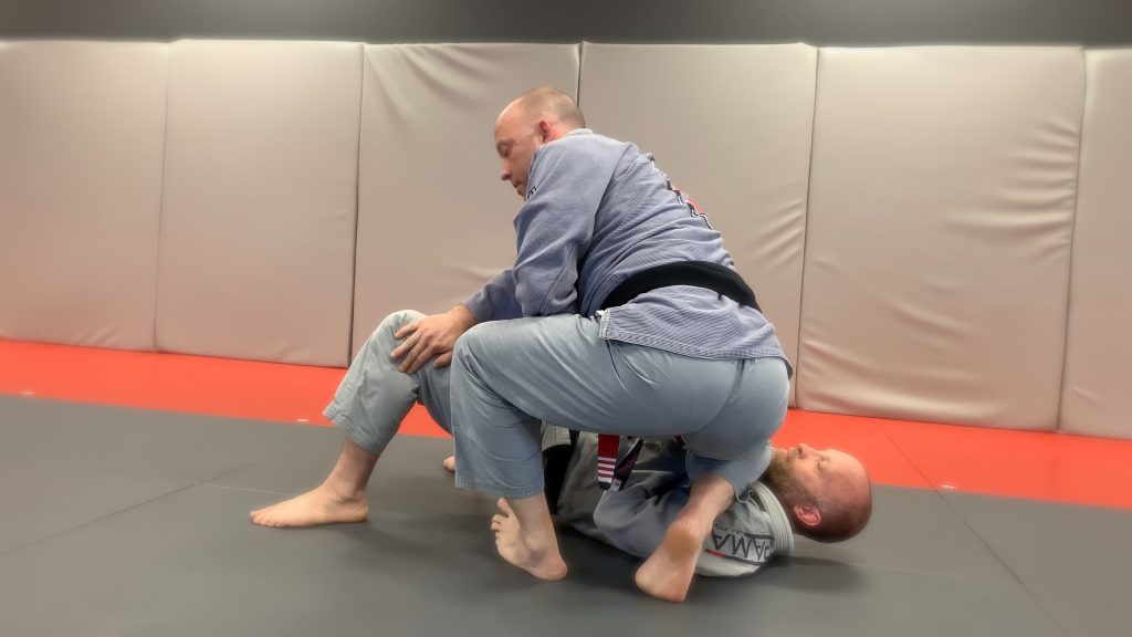 Starting to transition grab outside of leg Pendergrass Academy of Martial Arts