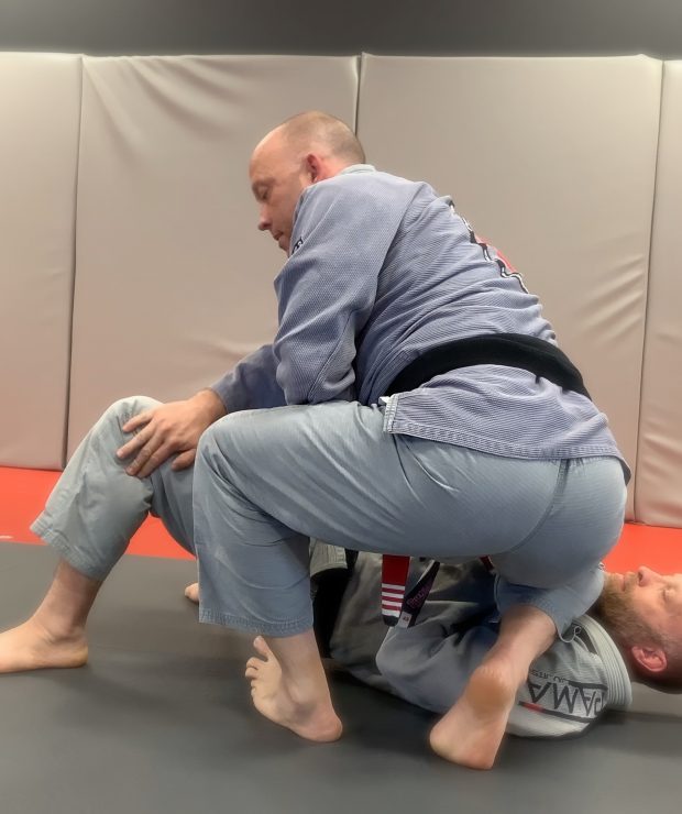 Starting to transition grab outside of leg Pendergrass Academy of Martial Arts